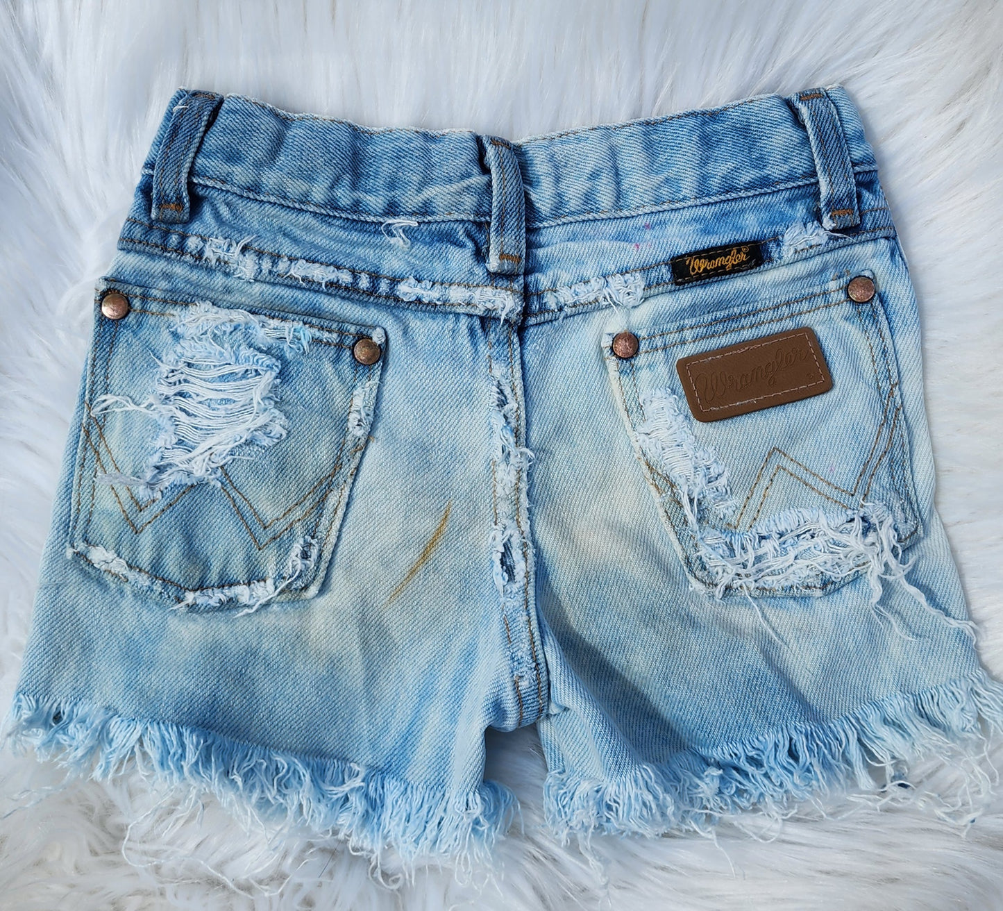 Distressed bleached wranglers