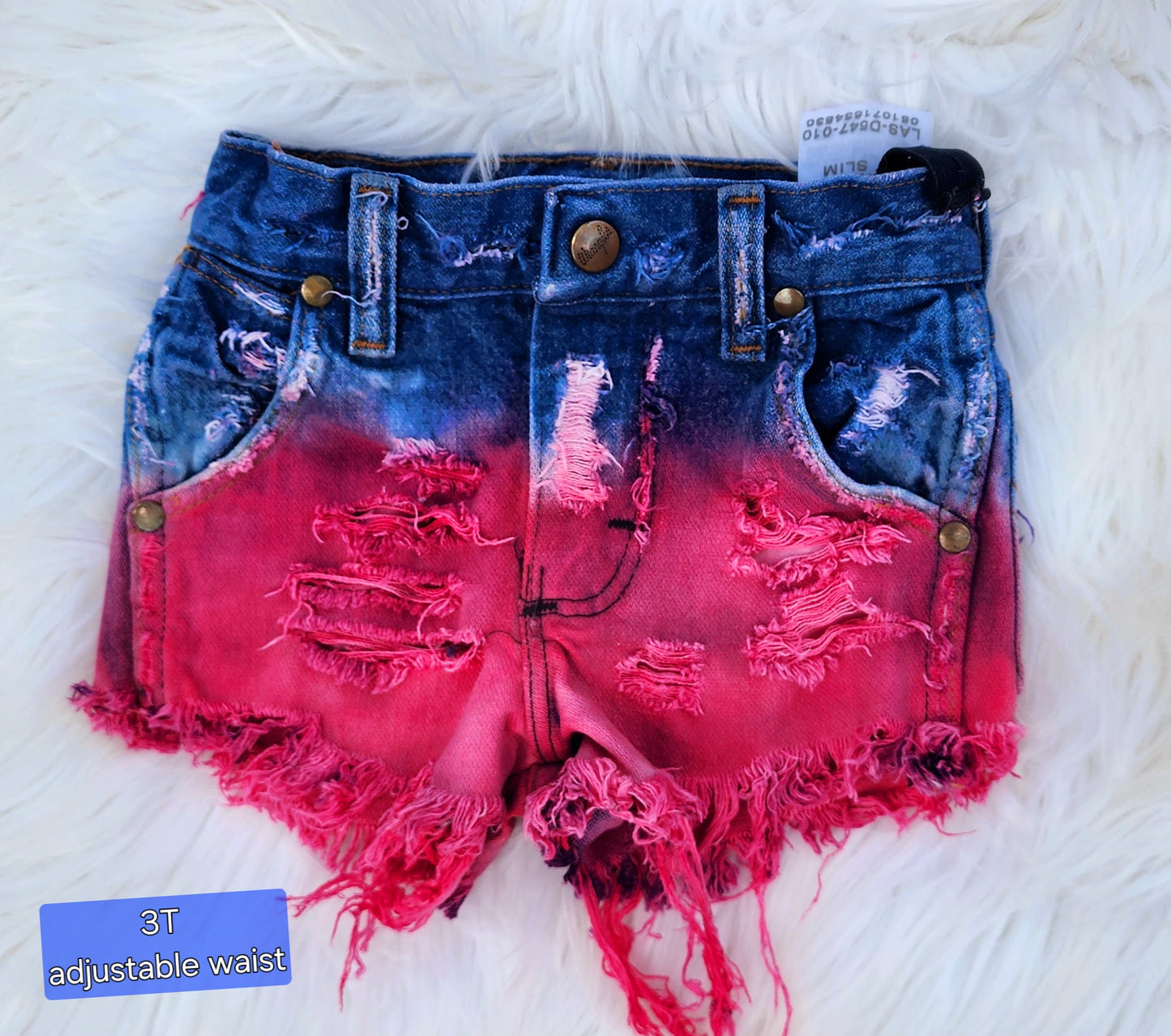 Hot pink distressed wranglers