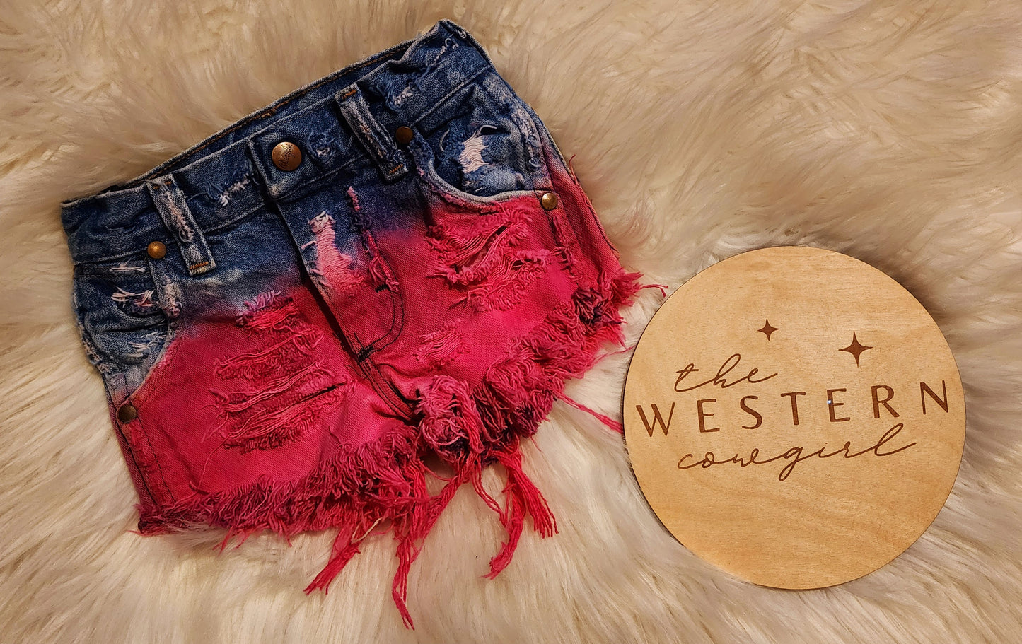 Hot pink distressed wranglers