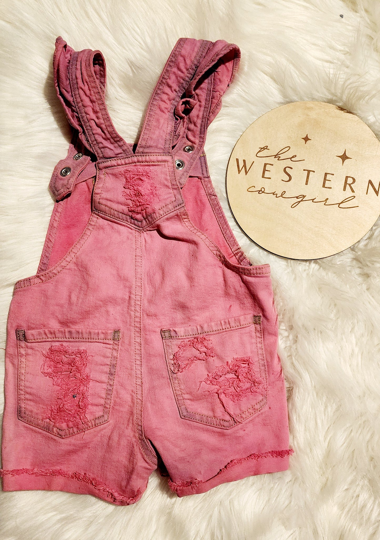 Pink dyed overalls