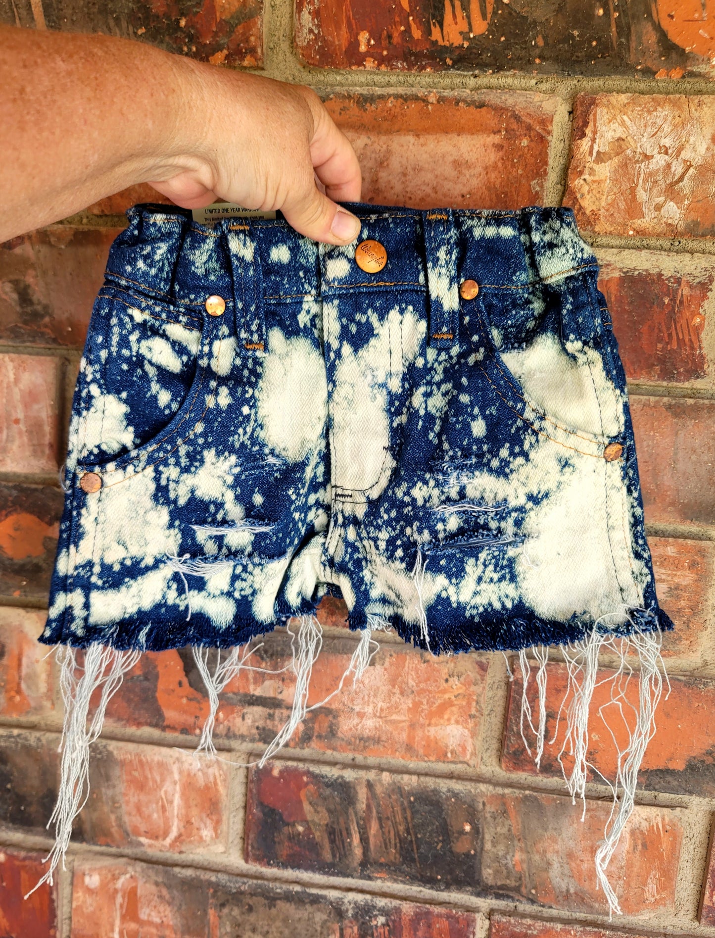 Distressed bleached wranglers 1T