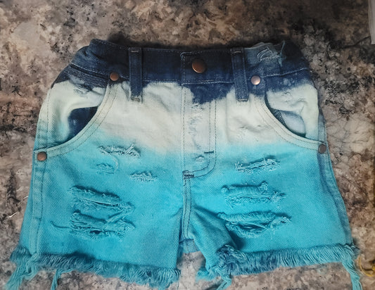 Turquoise distressed wranglers 3T shorts